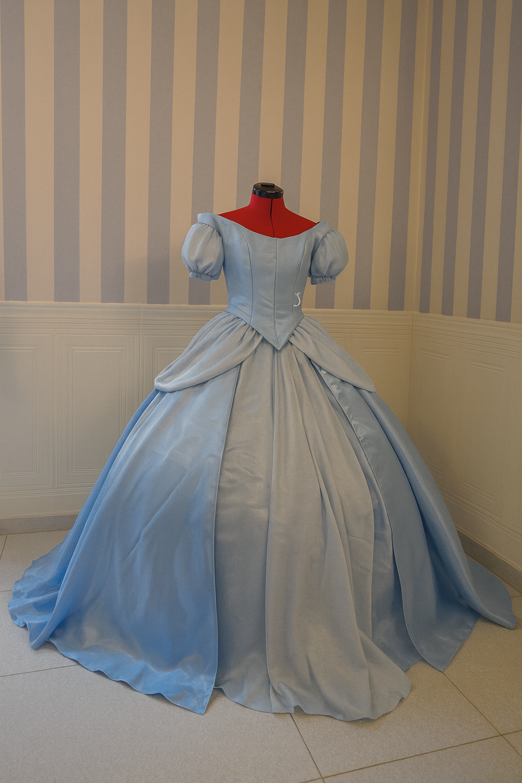 Light blue fairytale gown made of liquid organza, shown without petticoat for a soft elegant look.
