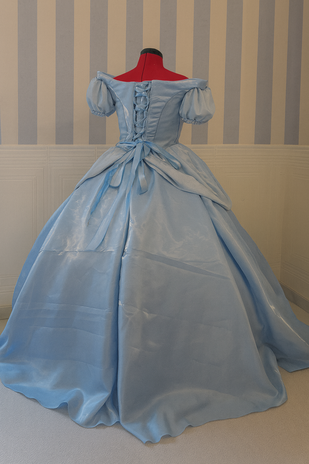Blue princess cosplay dress with shimmery organza fabric and optional accessories.