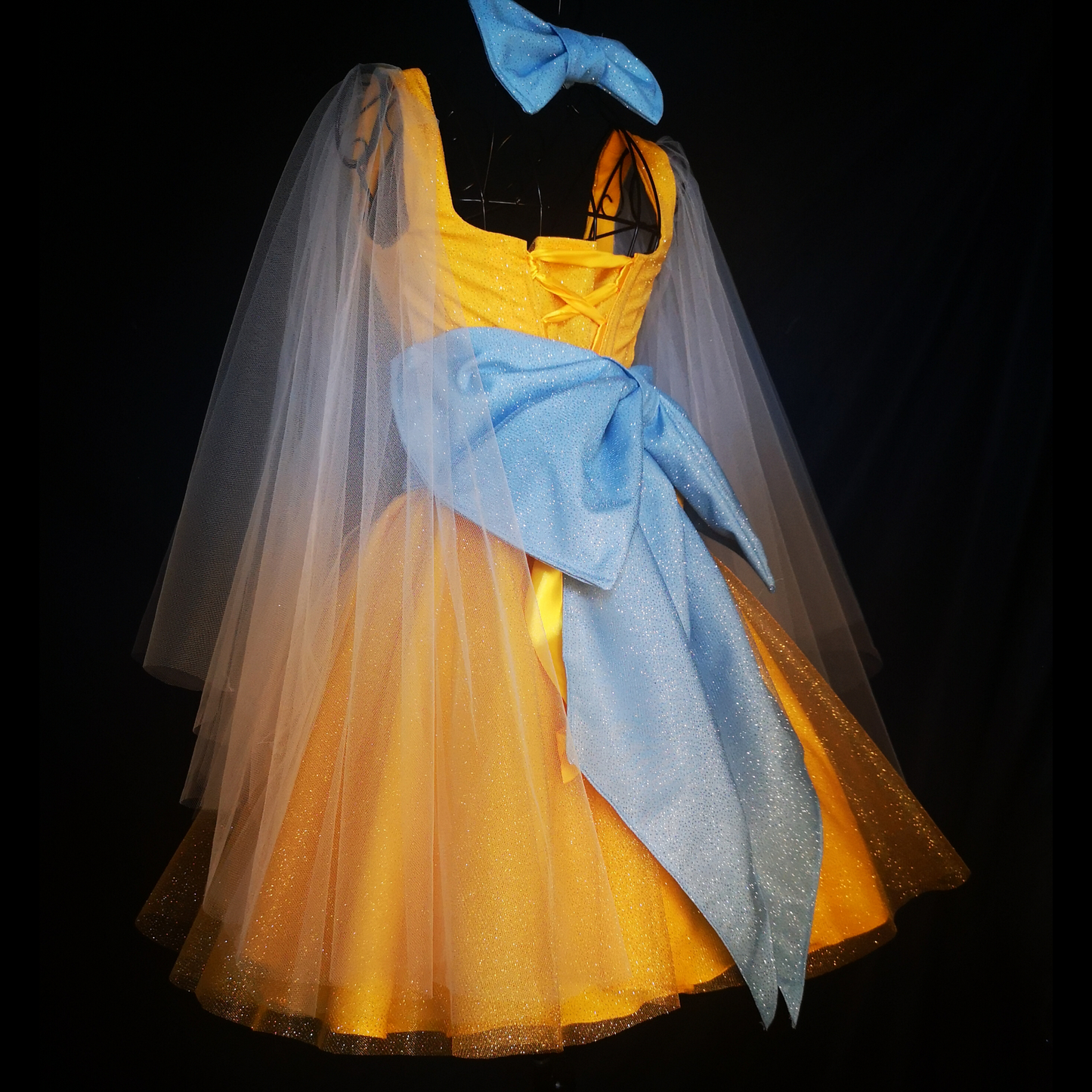 Detailed view of the boned corset and glittery tulle of the Grand Duchess cosplay.