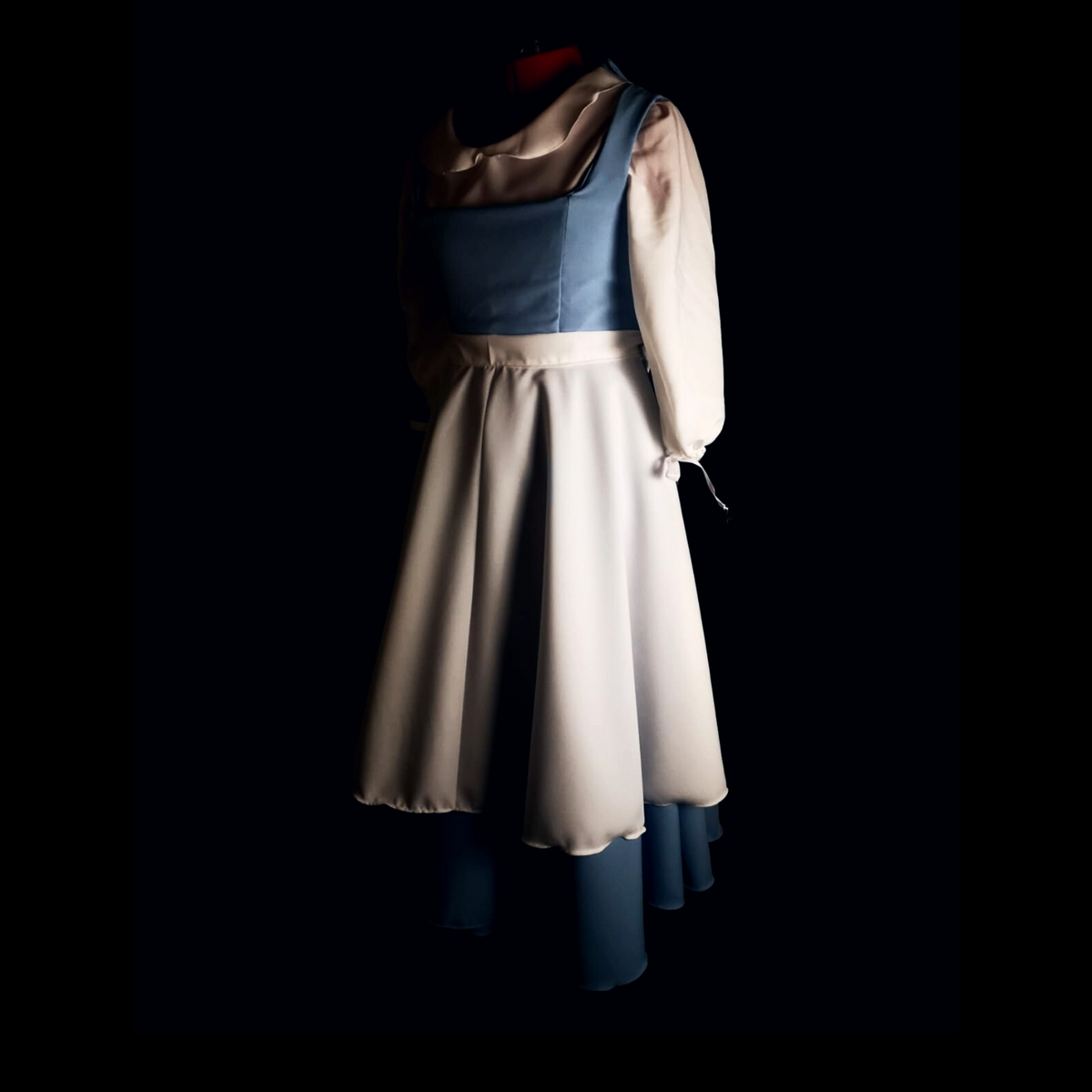 Blue storybook village dress with structured corset and full skirt