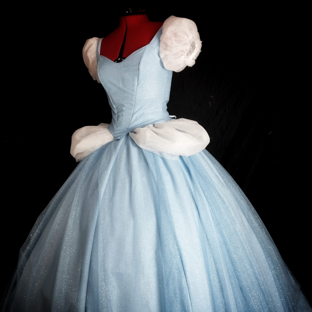 Ice blue fairytale ball gown with boned corset and layered skirt