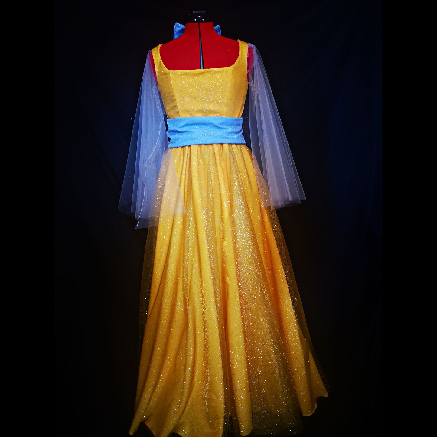 Grand Duchess theater costume set including the long amber dress, imperial gold tiara, signature necklace, and matching hair bow.