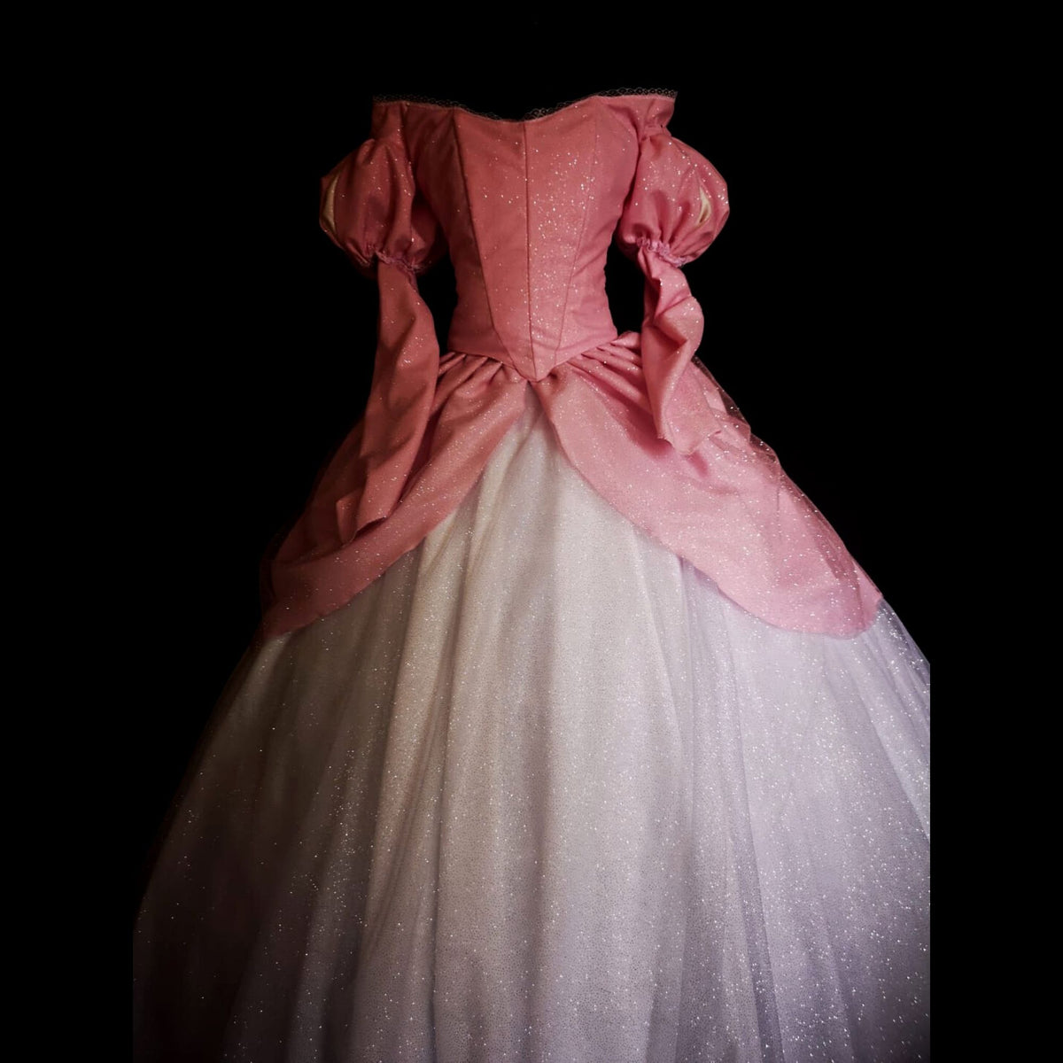 Pink mermaid fantasy ball gown with boned corset and voluminous skirt